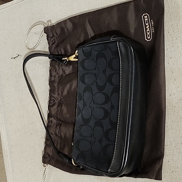 Coach Handbags - Coach black clutch